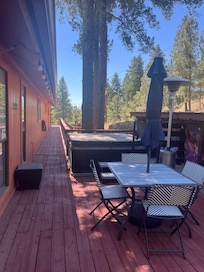 Hot tub area, road goes right behind tree and shed on the right