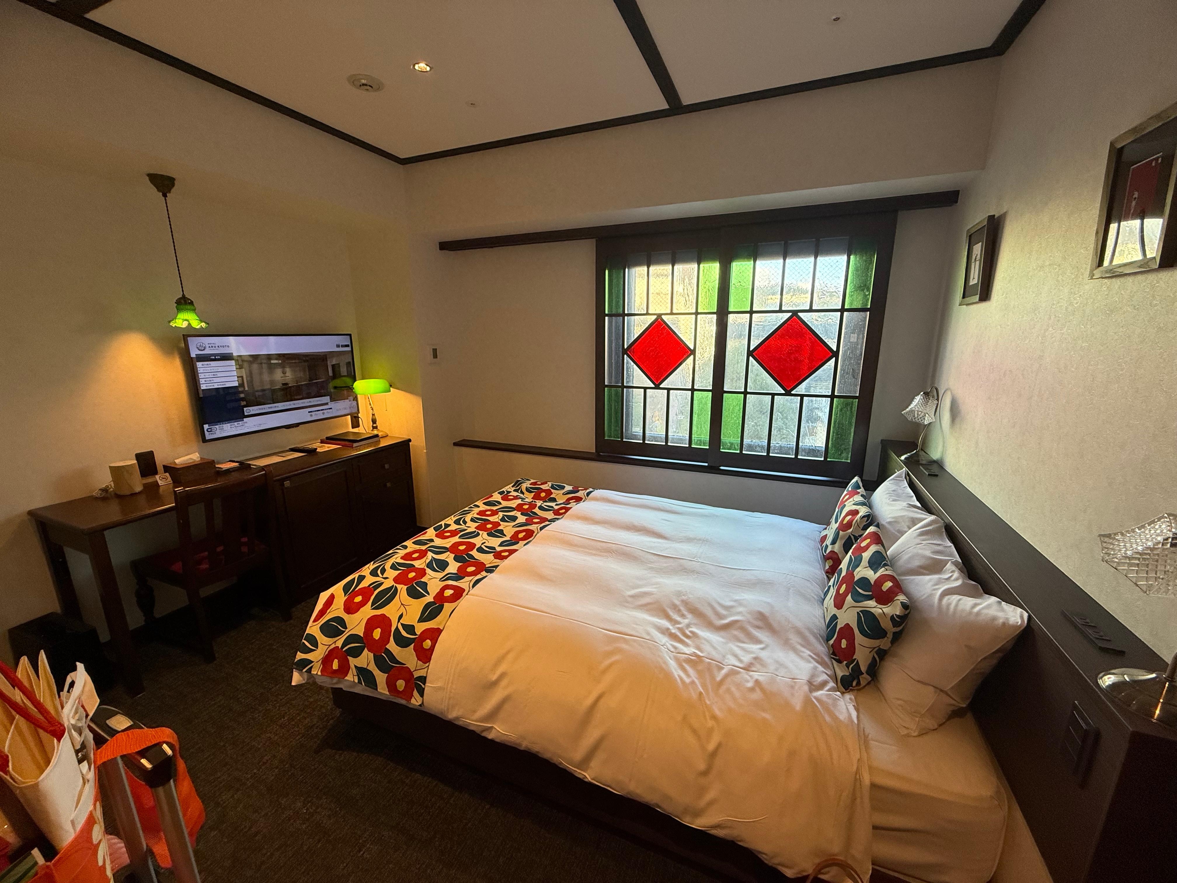 Charming! Love the sliding stained glass windows.