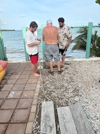 Outside trying to build the crab trap! Lol