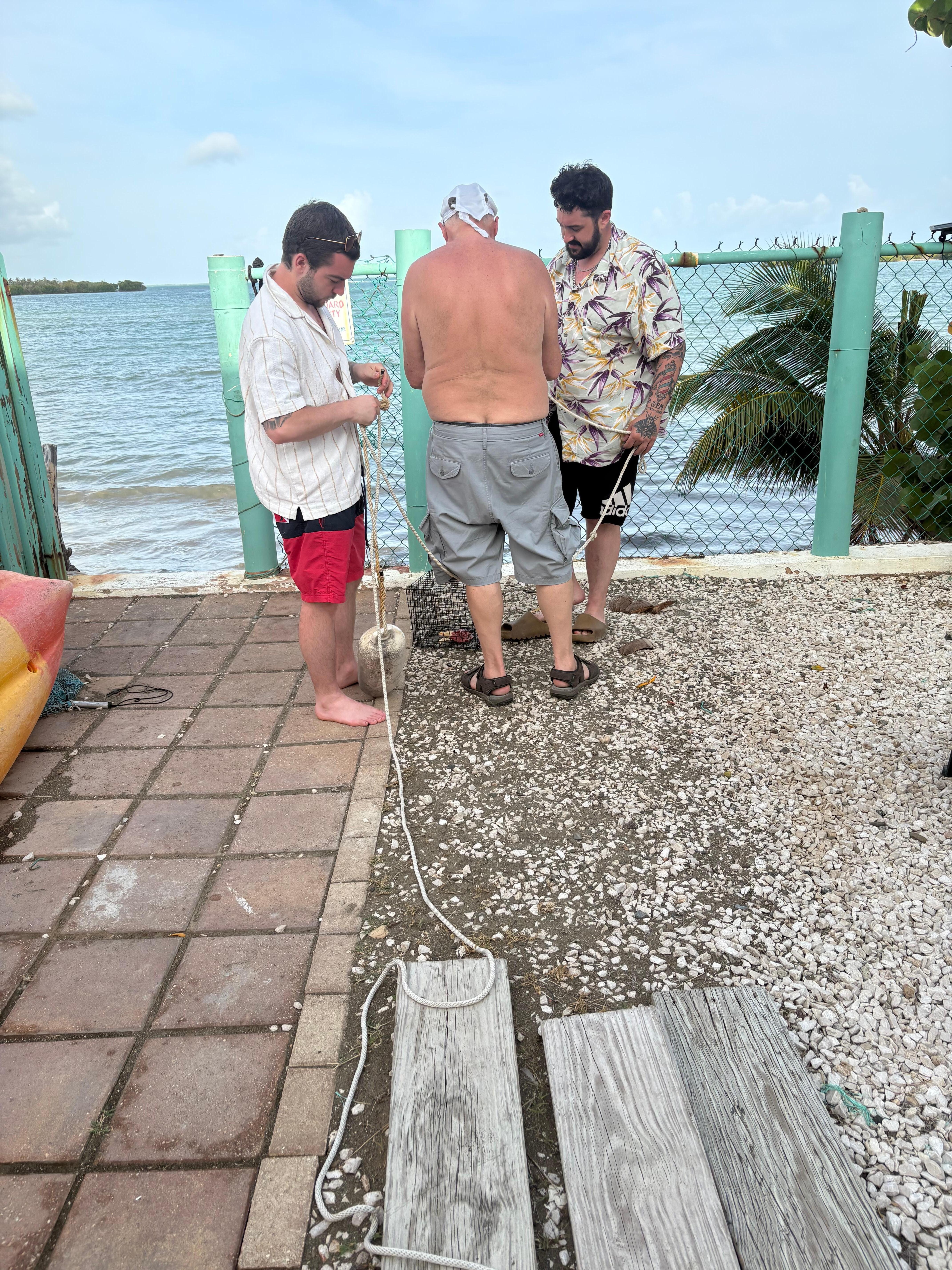 Outside trying to build the crab trap! Lol
