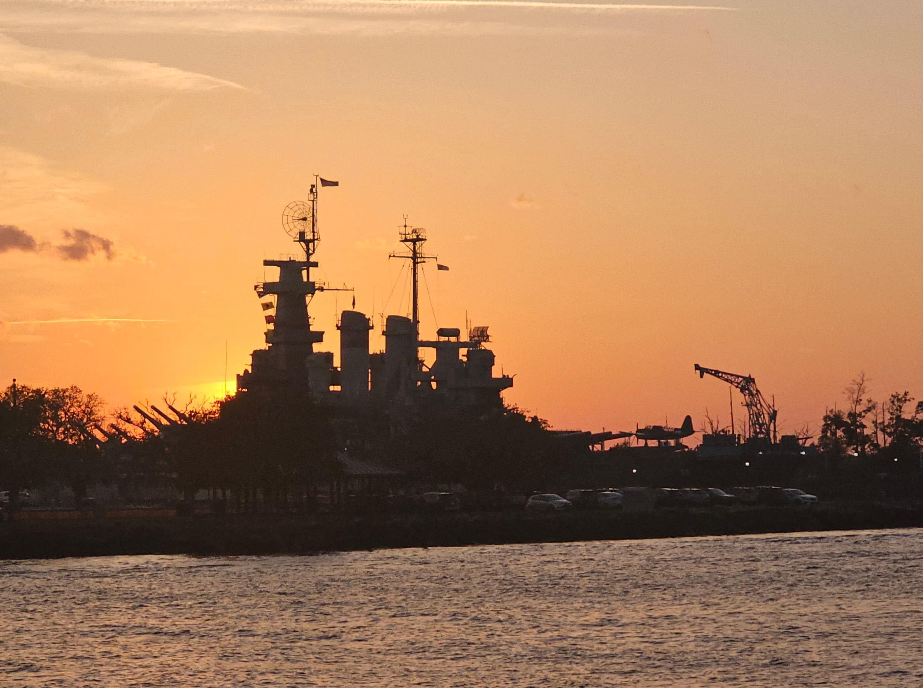 Sunset behind the battleship