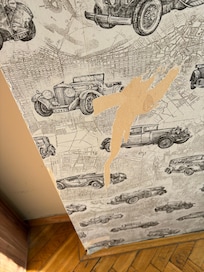 Chunks of wallpaper missing from walls