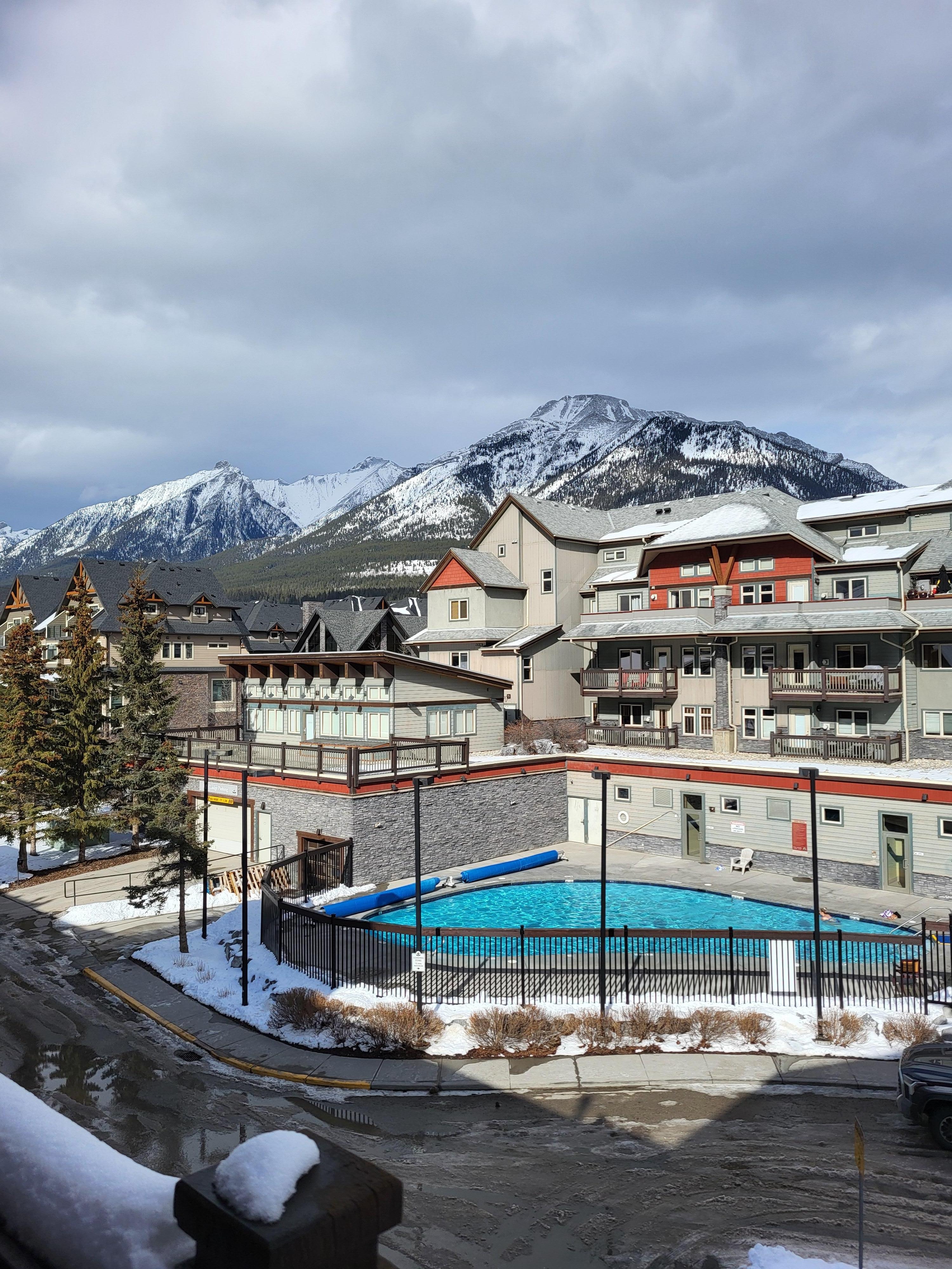 View of pool and hot tub from the balcony