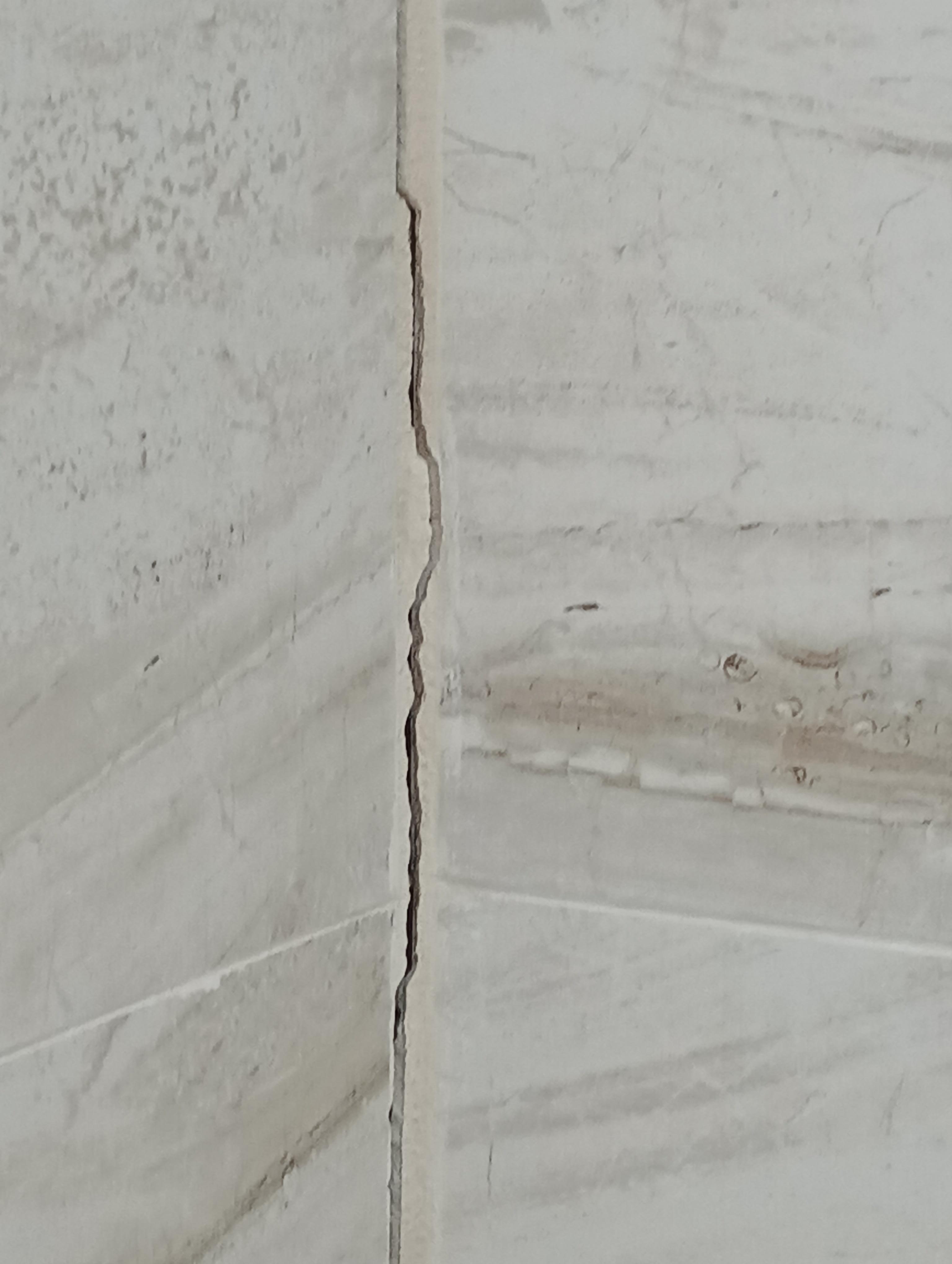 Cracks in Master bathroom shower walls
