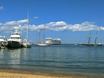 Watching the ferry from the hotel's beach