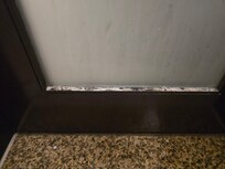 bathroom door with dust