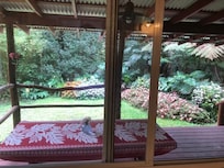 Front porch, beautiful place to have meals.