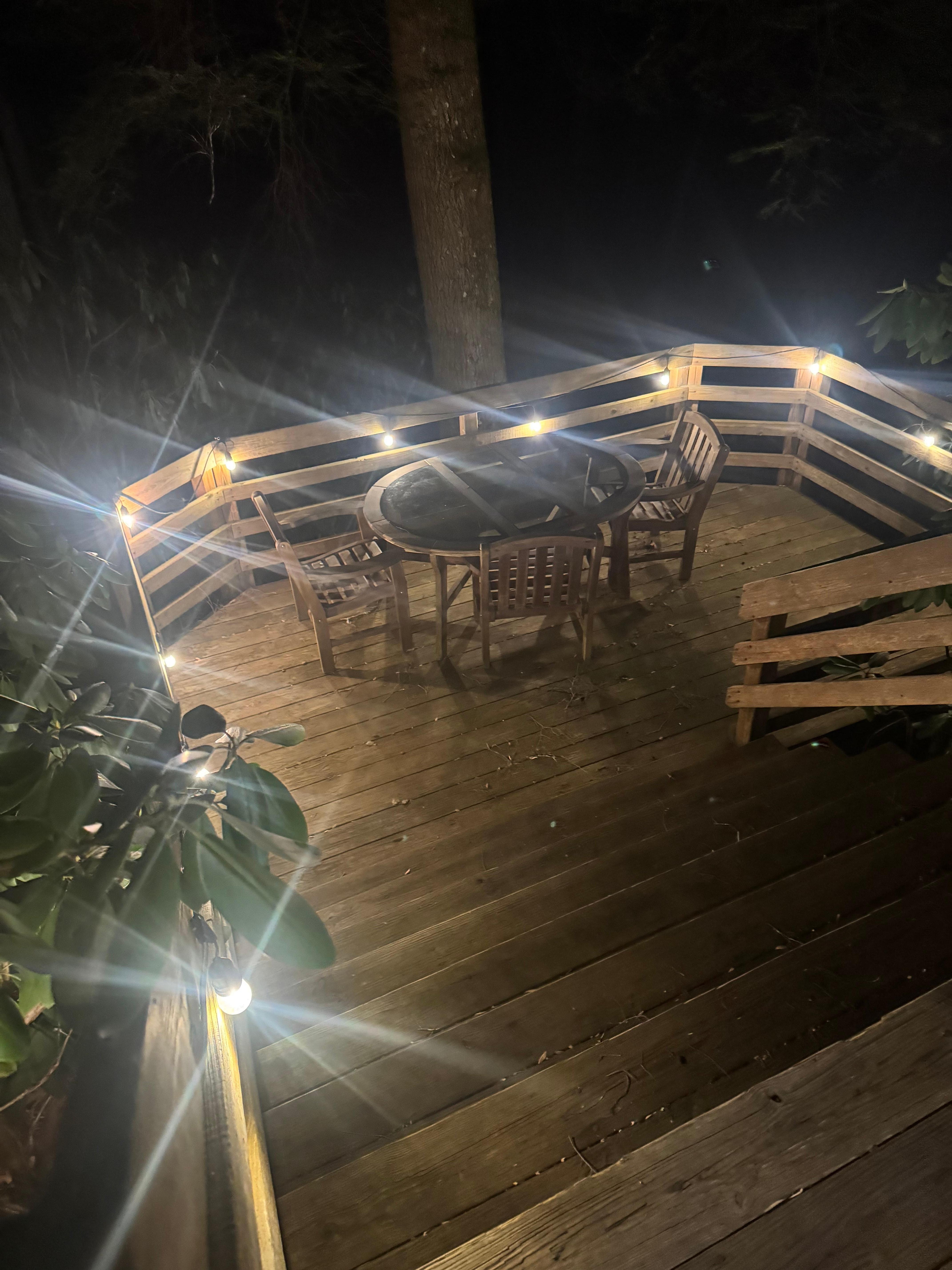 The lower back porch. There is a stream just below that is so nice to listen to and
look at! 