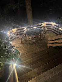 The lower back porch. There is a stream just below that is so nice to listen to and
look at!