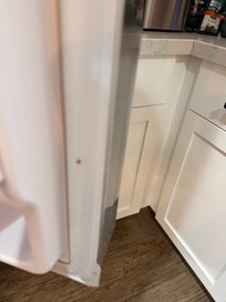 Red substance on refrigerator upon check in