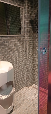 Right side of the bathroom
Shower and sink. :)