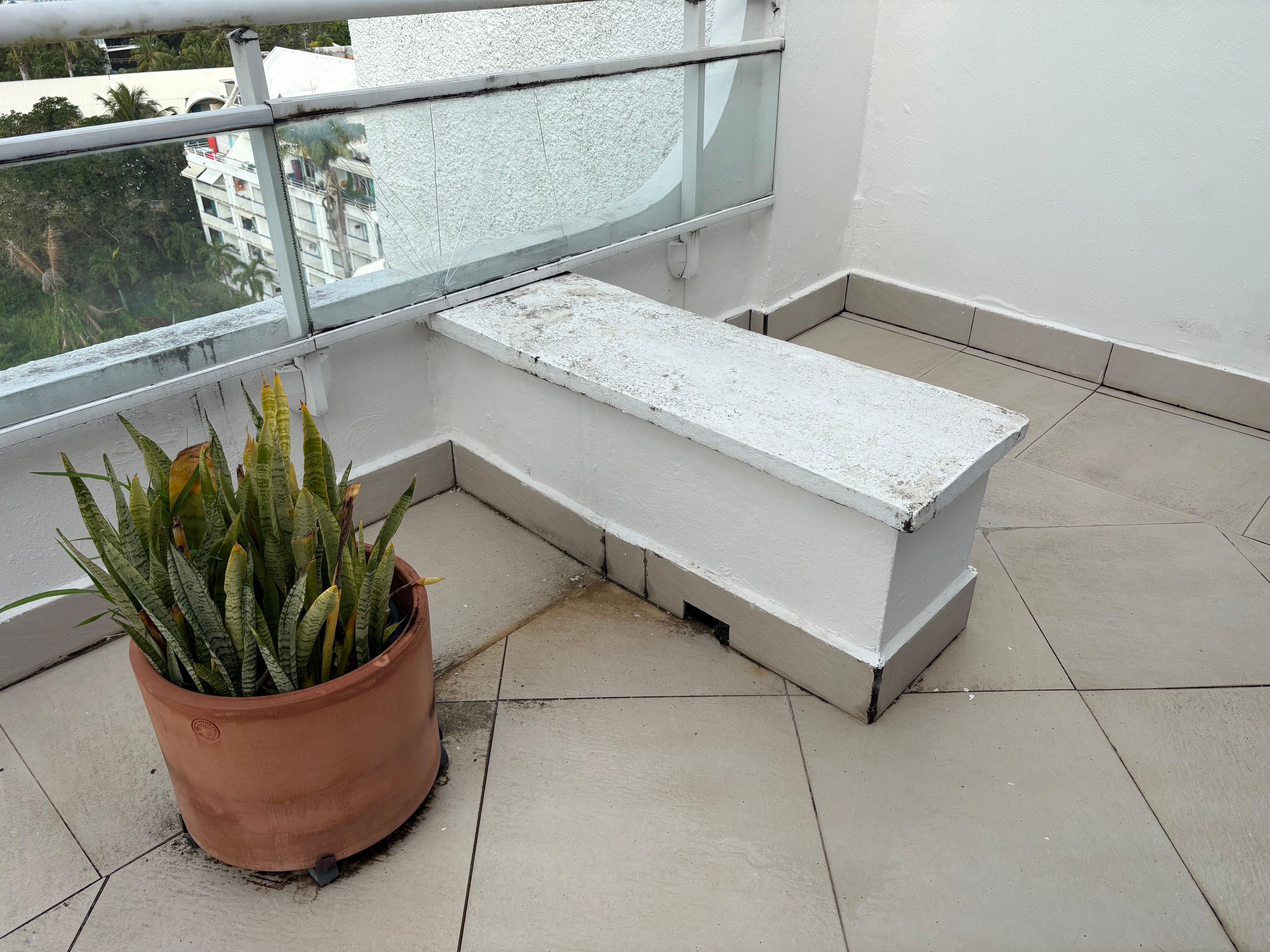 Old dirty furniture in the dirty balcony that nobody bothers to clean