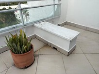 Old dirty furniture in the dirty balcony that nobody bothers to clean