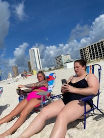 Loving the beach and just a few feet from unit 603. Happy times.