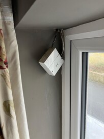 BT box hanging off wall