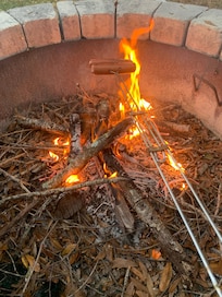 Roasting hot dogs , then smores