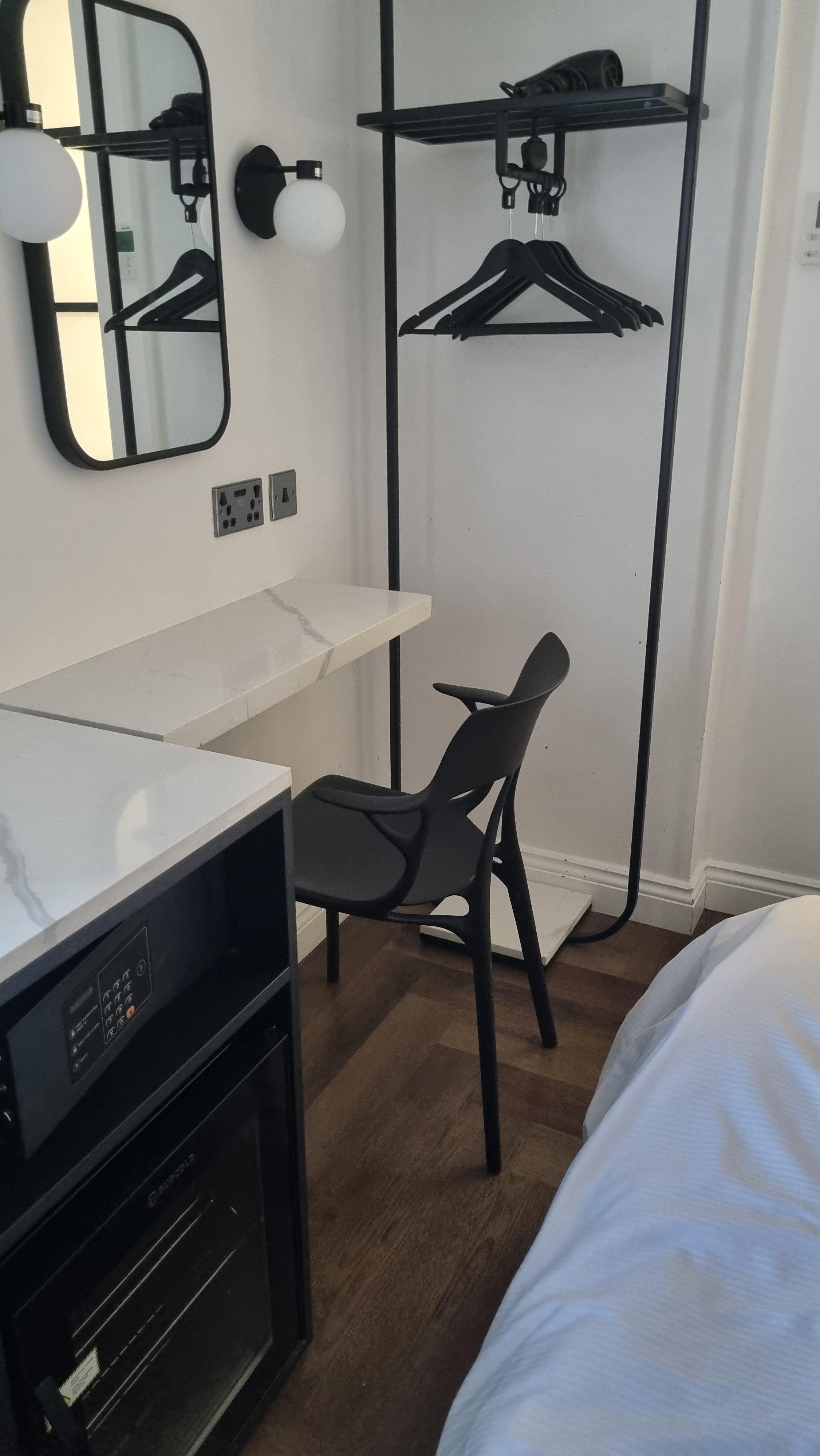 Limited leg room around bed, okay for solo guest not two.