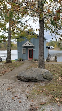 Entrance into home very easily accessible with paved walkway up to residence.
