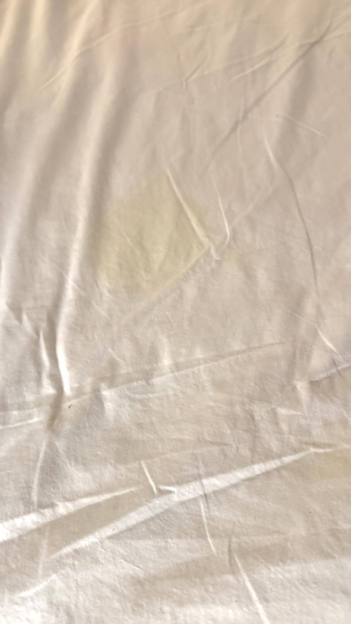 More large yellow stains on sheets
