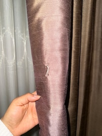 Holes on curtains