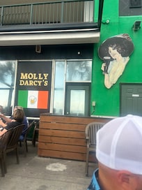 Irish Pub/ Restauraunt next door. Live music, with indoor/ outdoor seating.