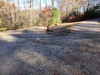 This is a photo of the sign (you have to zoom in to see it) and where you have to turn to get to the cabin.