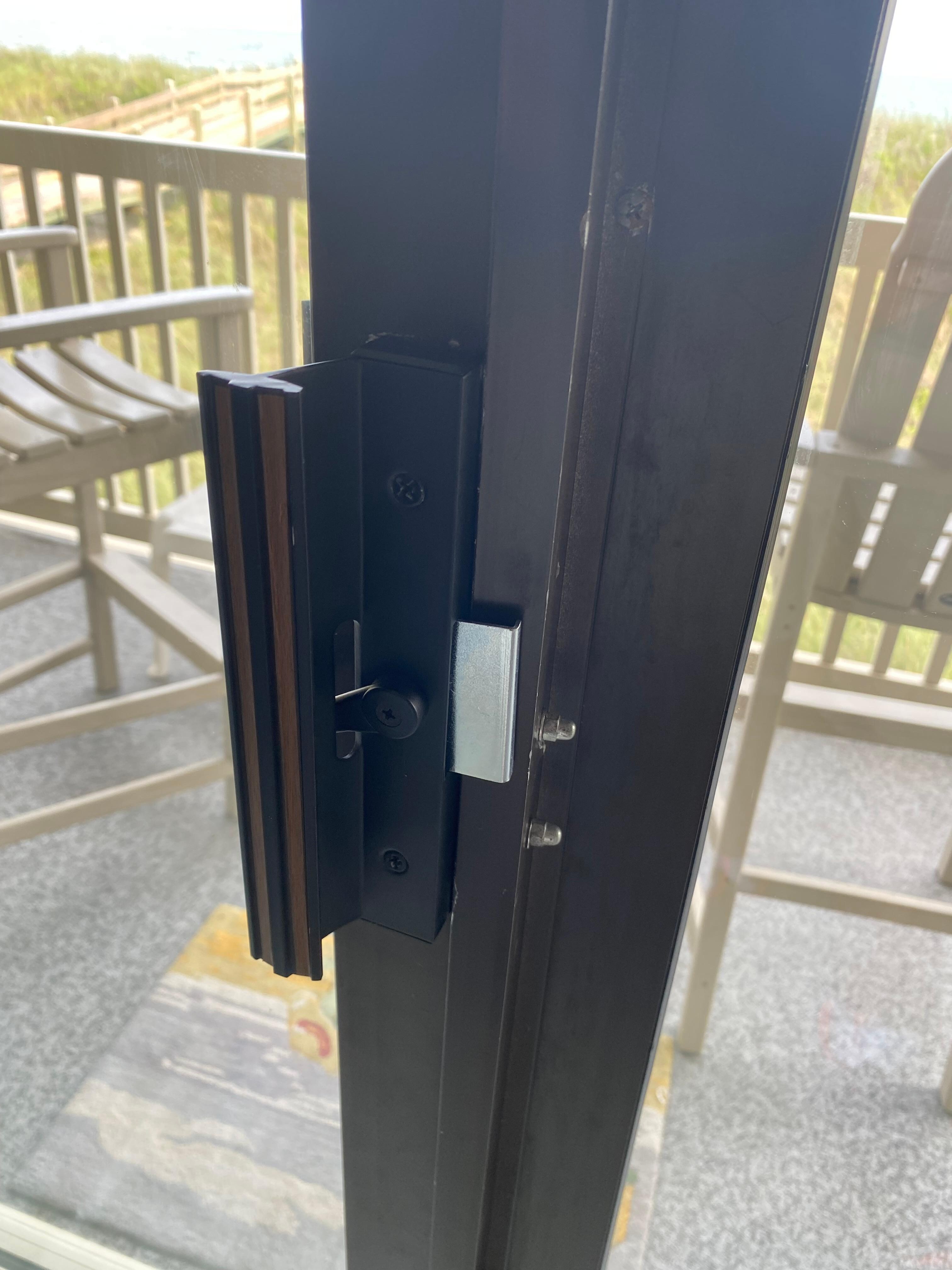 Sliding door missing bracket for latch