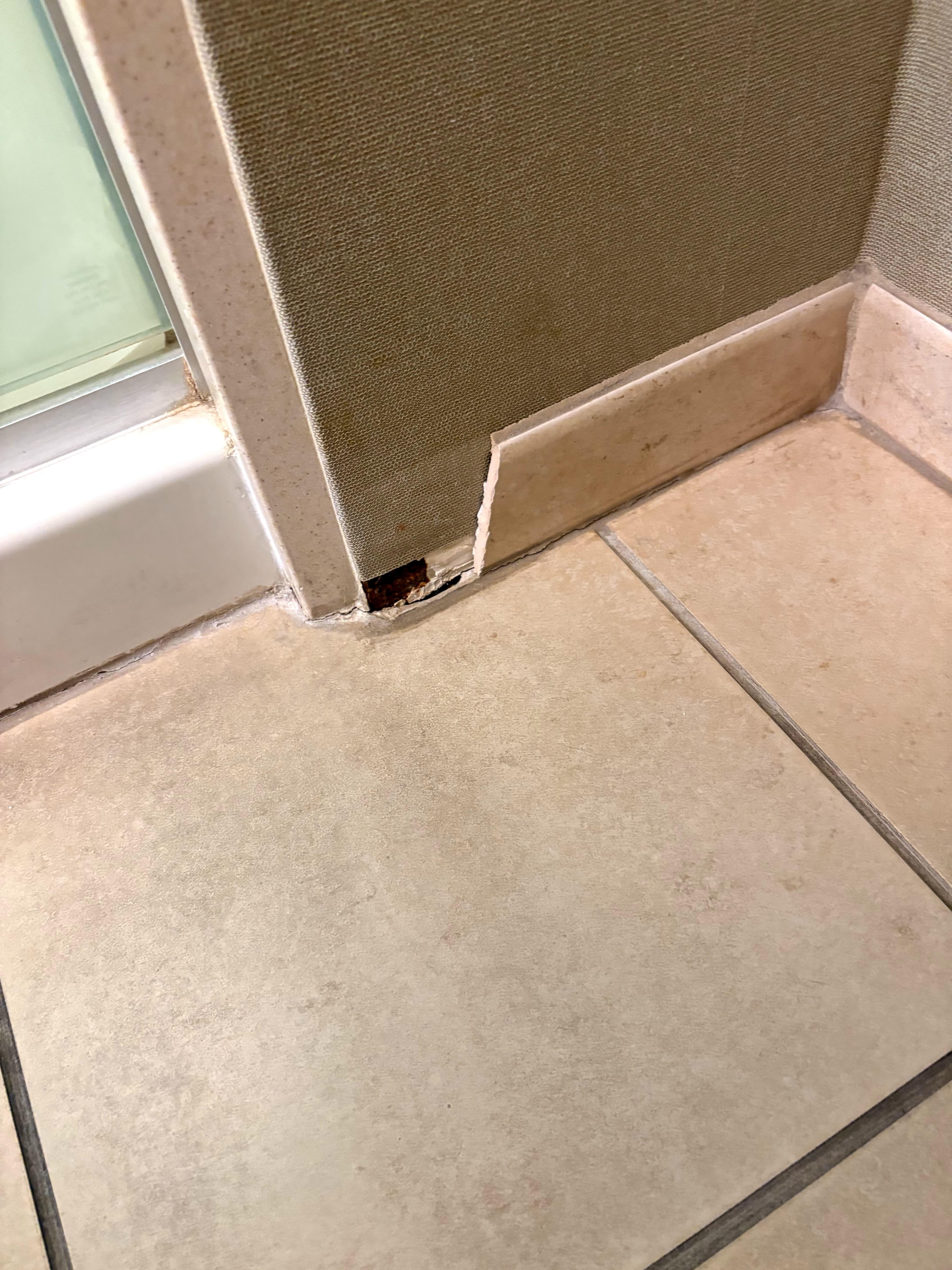 Broken wall in bathroom 