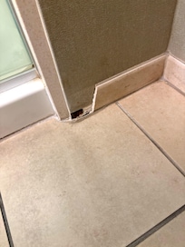 Broken wall in bathroom