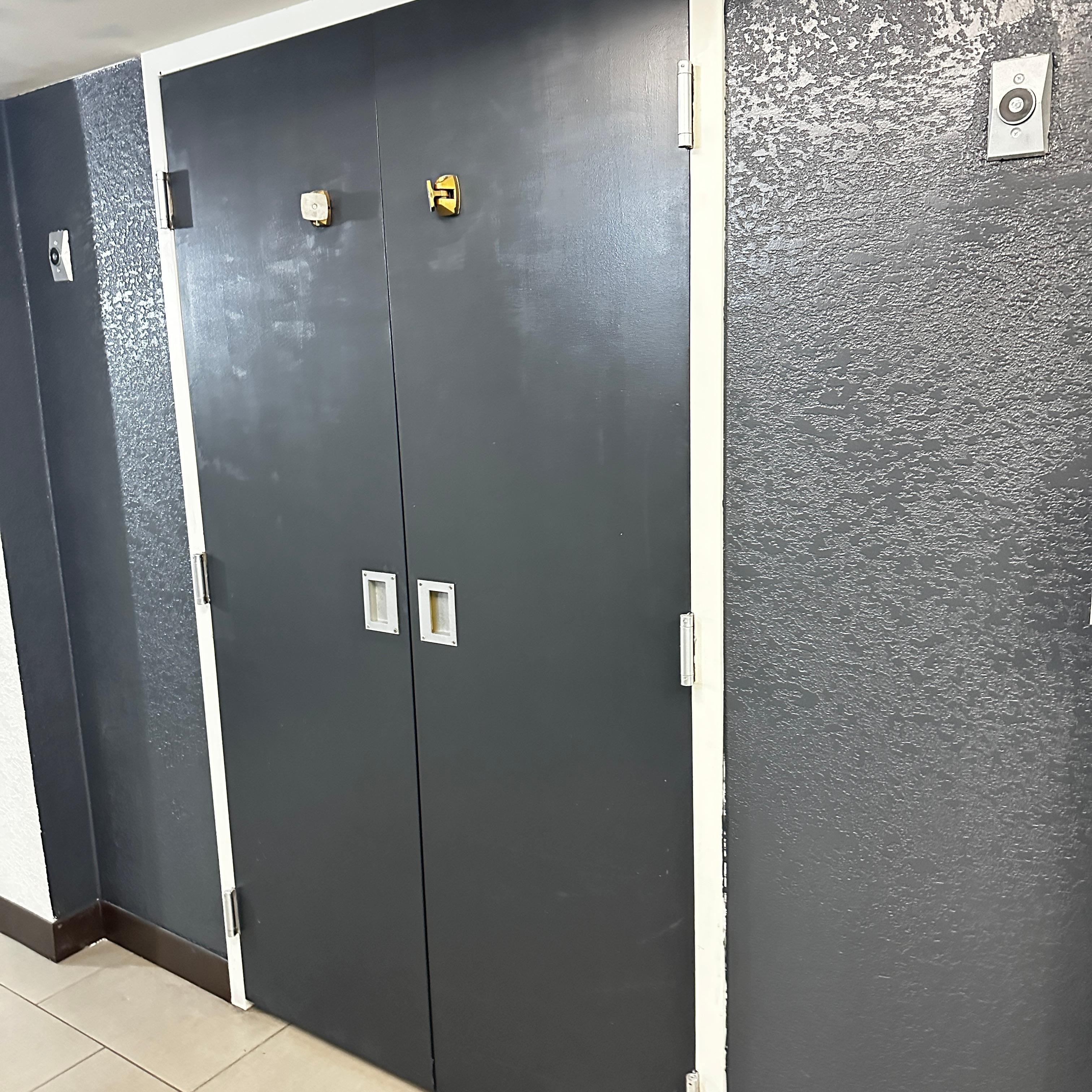 Boarded up second elevator
