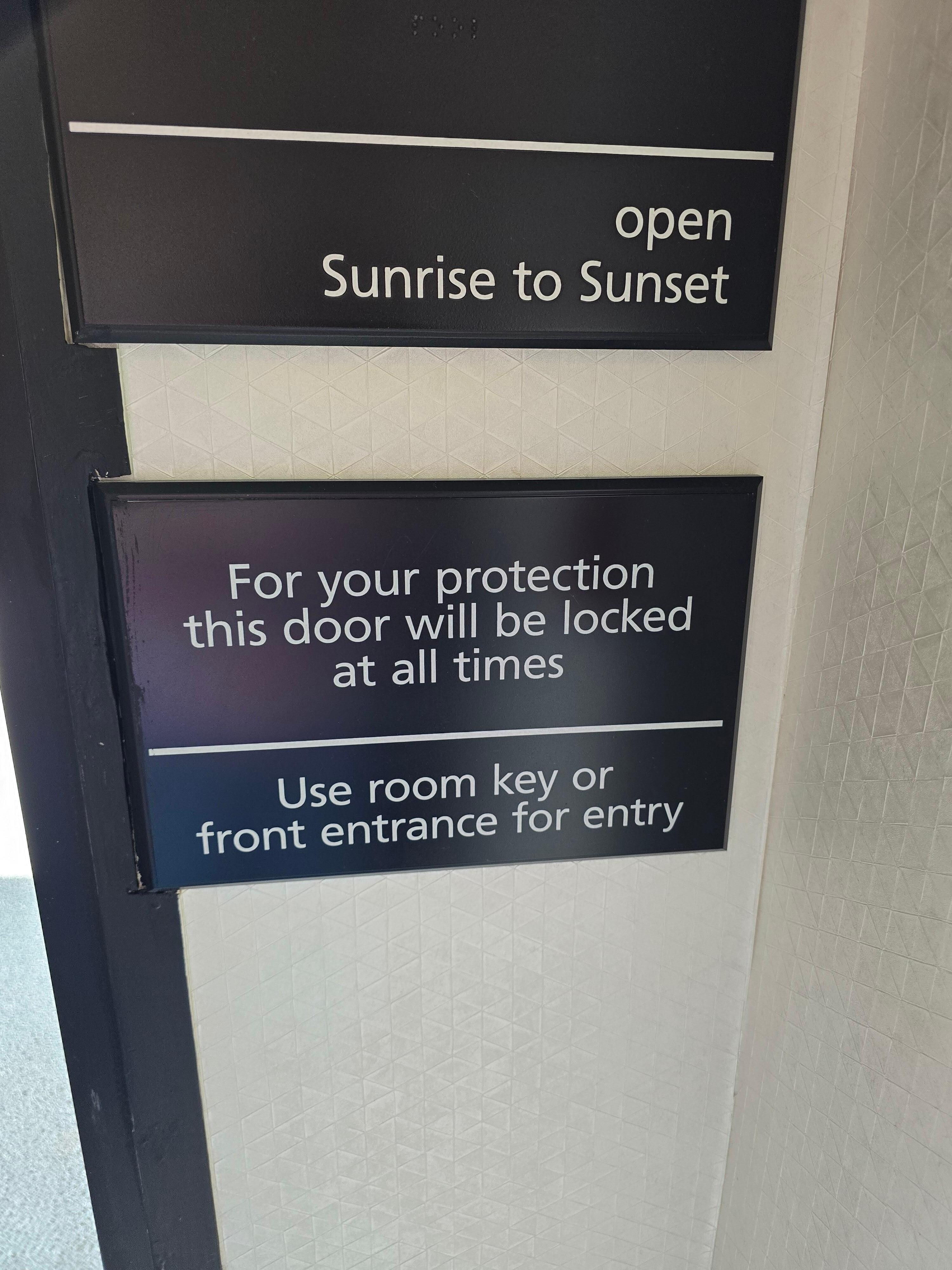 Sign stating doors to be locked.  Still not locked after 11pm 