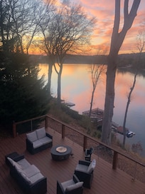 View from top deck to bottom fire pit patio