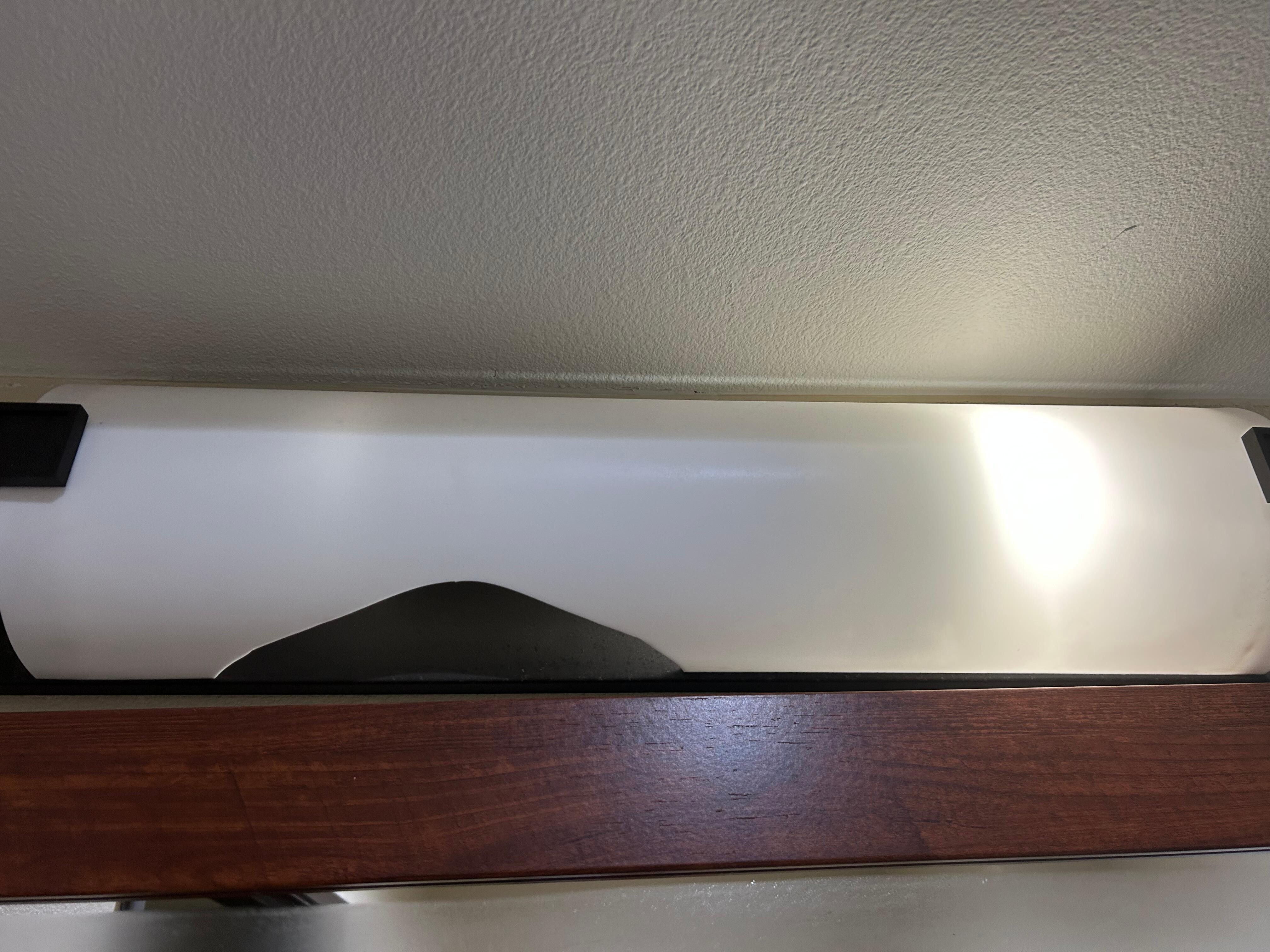 Light fixture broken and missing a light 