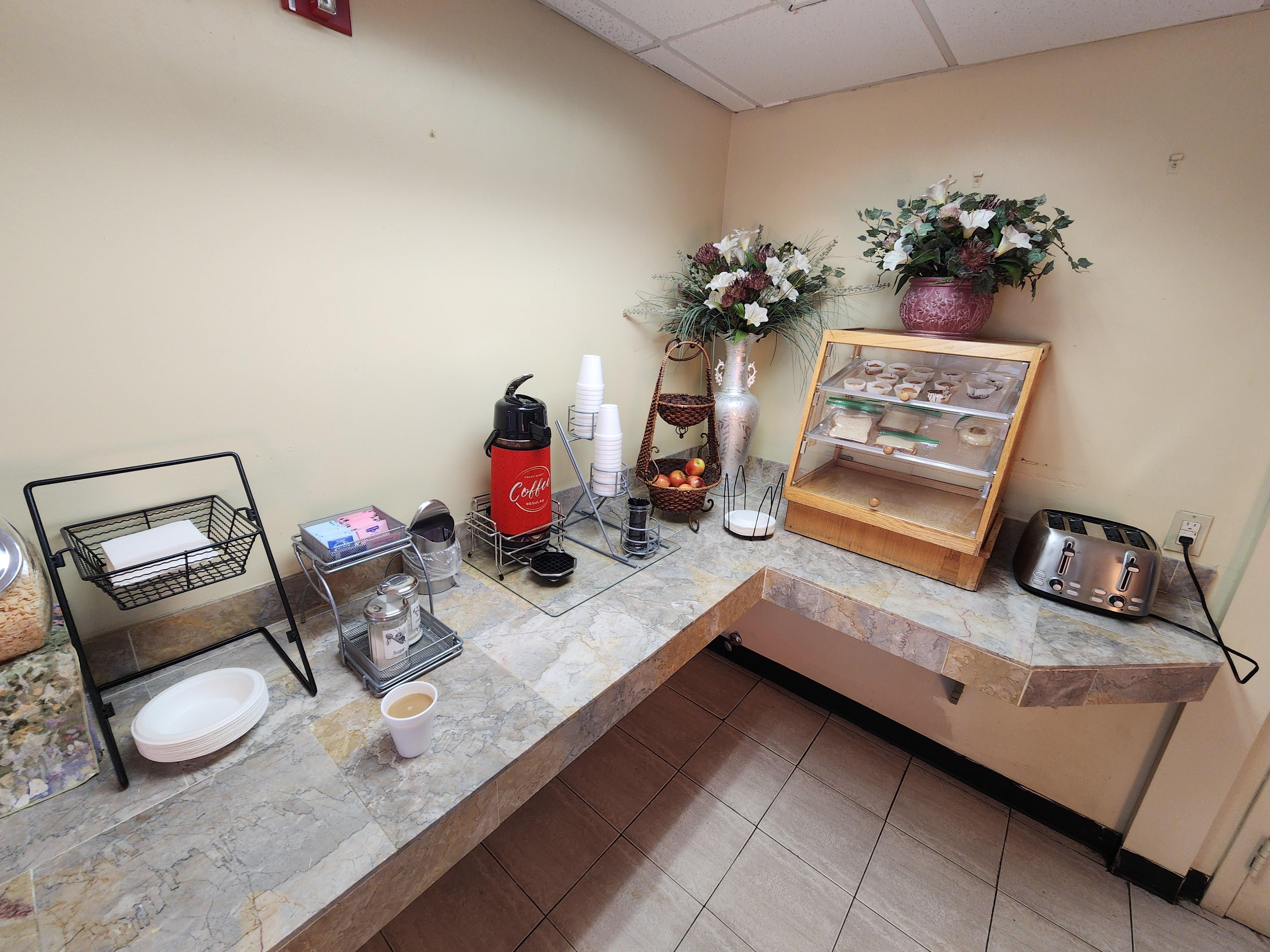Continental breakfast.  There were two dry cereal dispensers too the left, a beverage cooler and waffle maker to the right.
