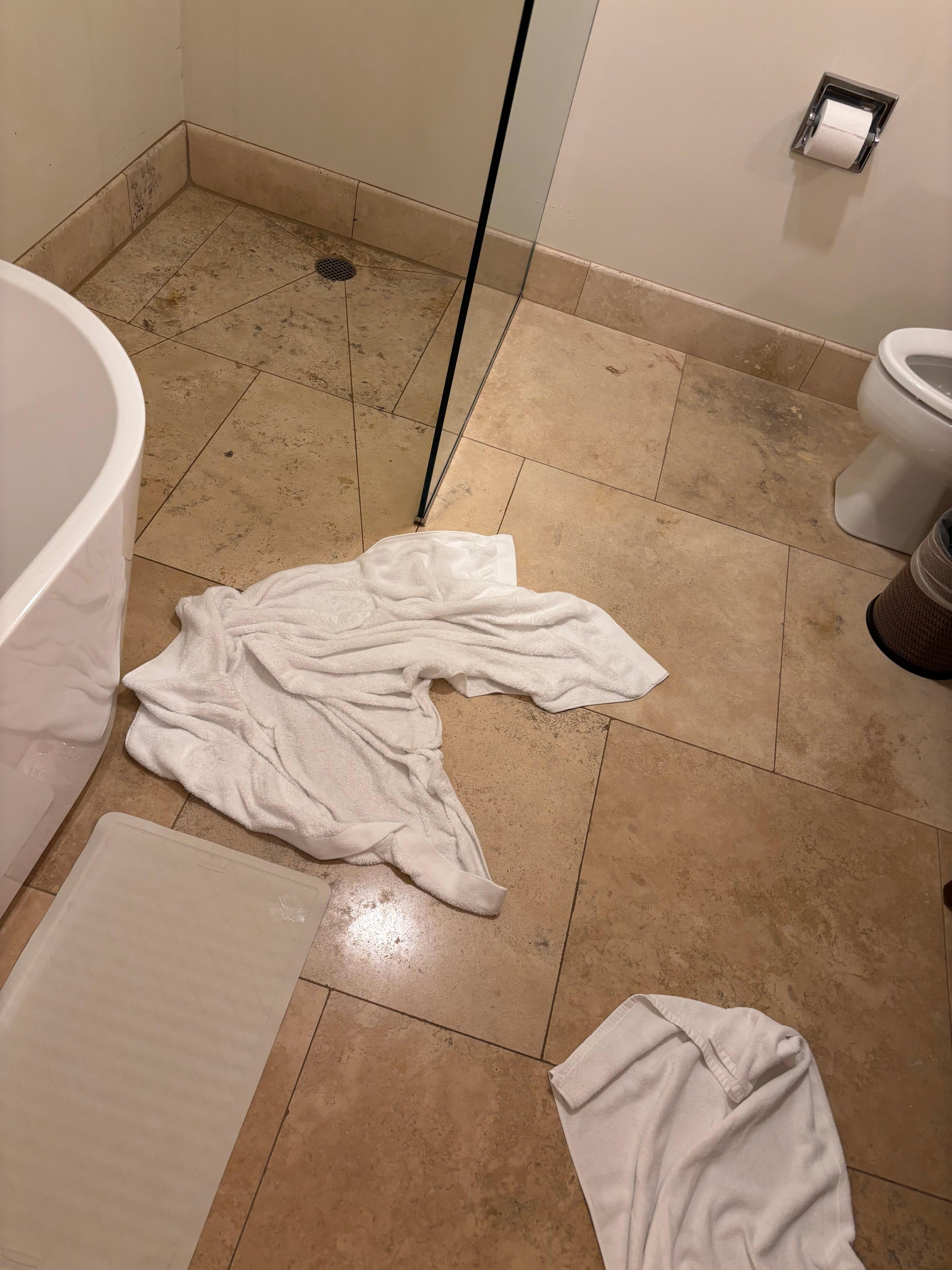 Take a shower, be careful, that tile is slick as….