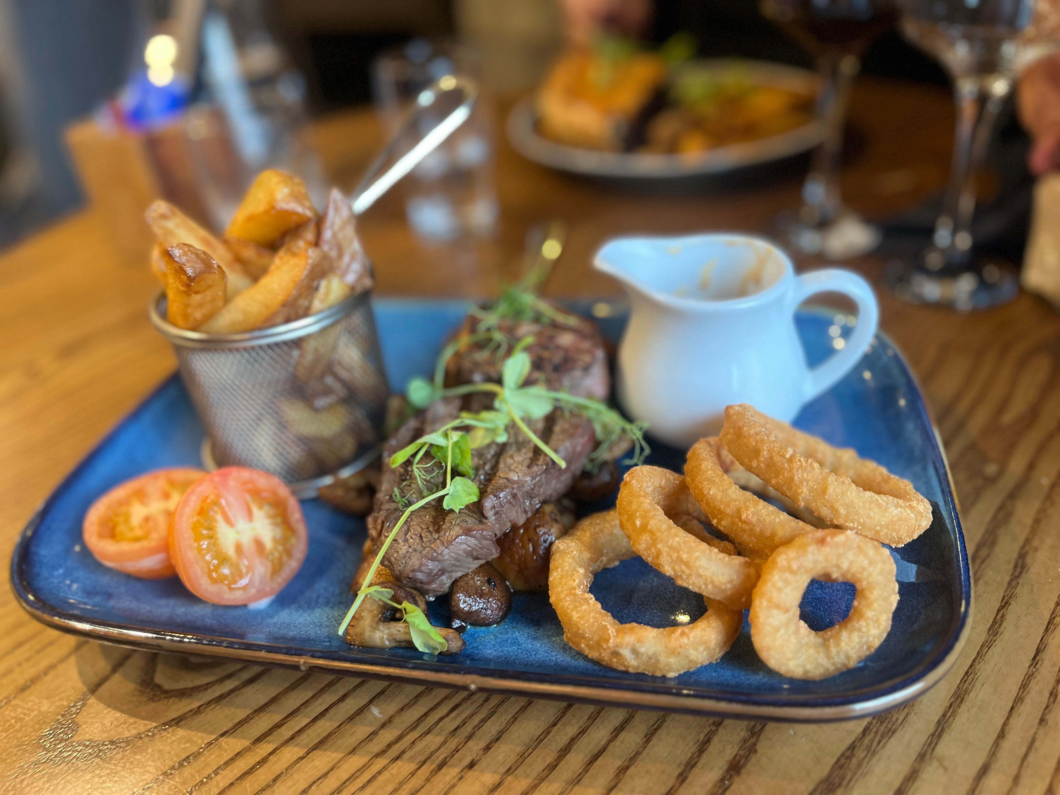 2 medallions of steak with peppercorn sauce- cooked to perfection