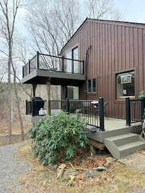 Balcony and covered deck for grilling.