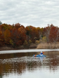 Kayaking in the lake behind the home