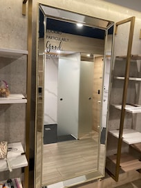 Large mirror with shelves