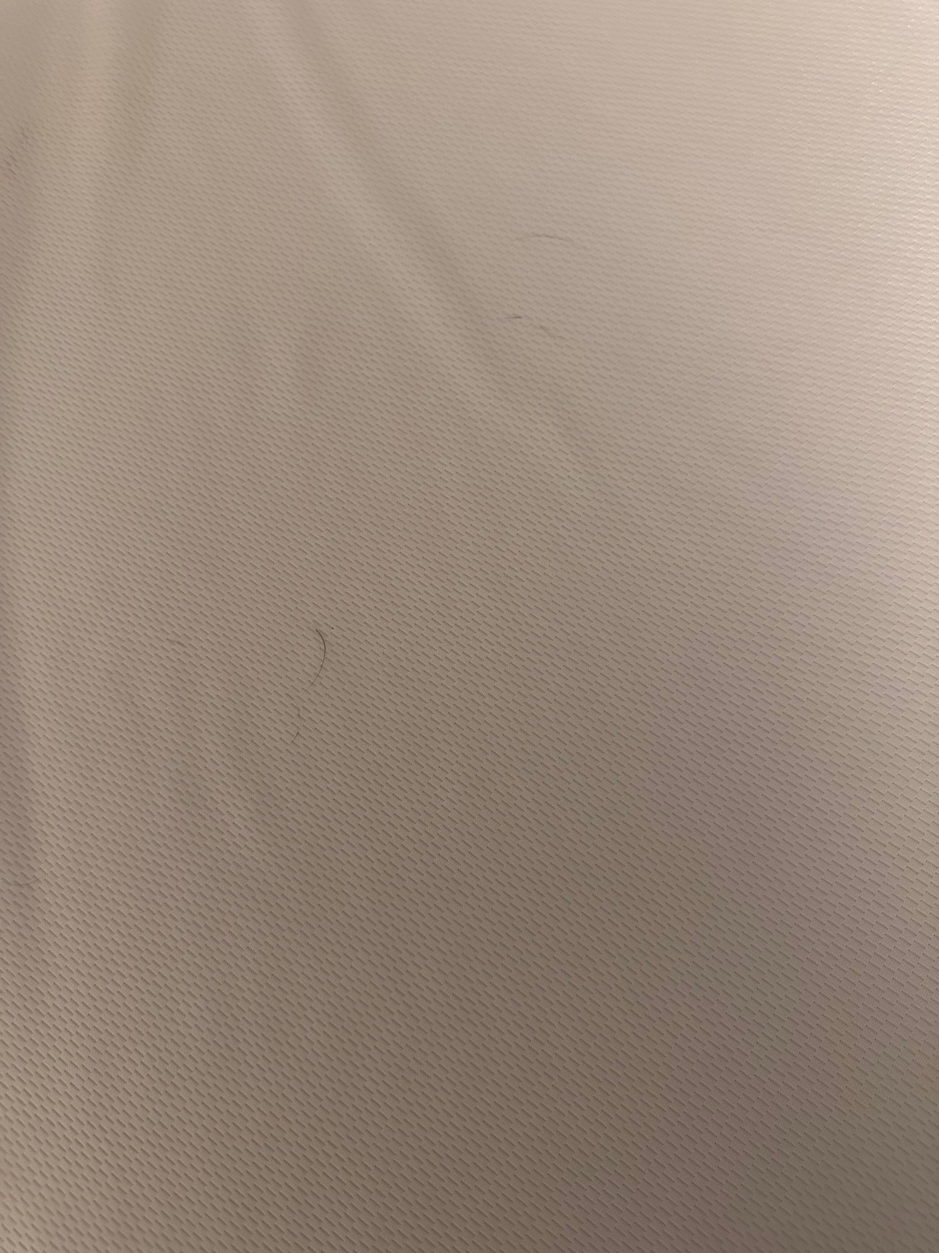 Hair under the sheets. 