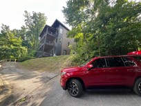 Property with the car we took. Behind the car is more driveway, I just parked close