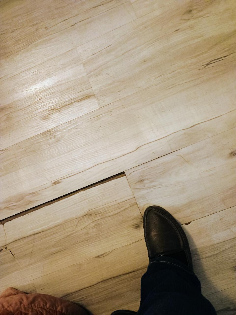The boards near my foot are broken and if stepped on wrong, a person could go through and be injured.