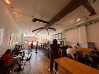 The coffee shop downstairs.
