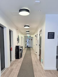 Hallway with water and amenities station