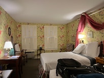 Note the use of shutters instead of blinds or draperies