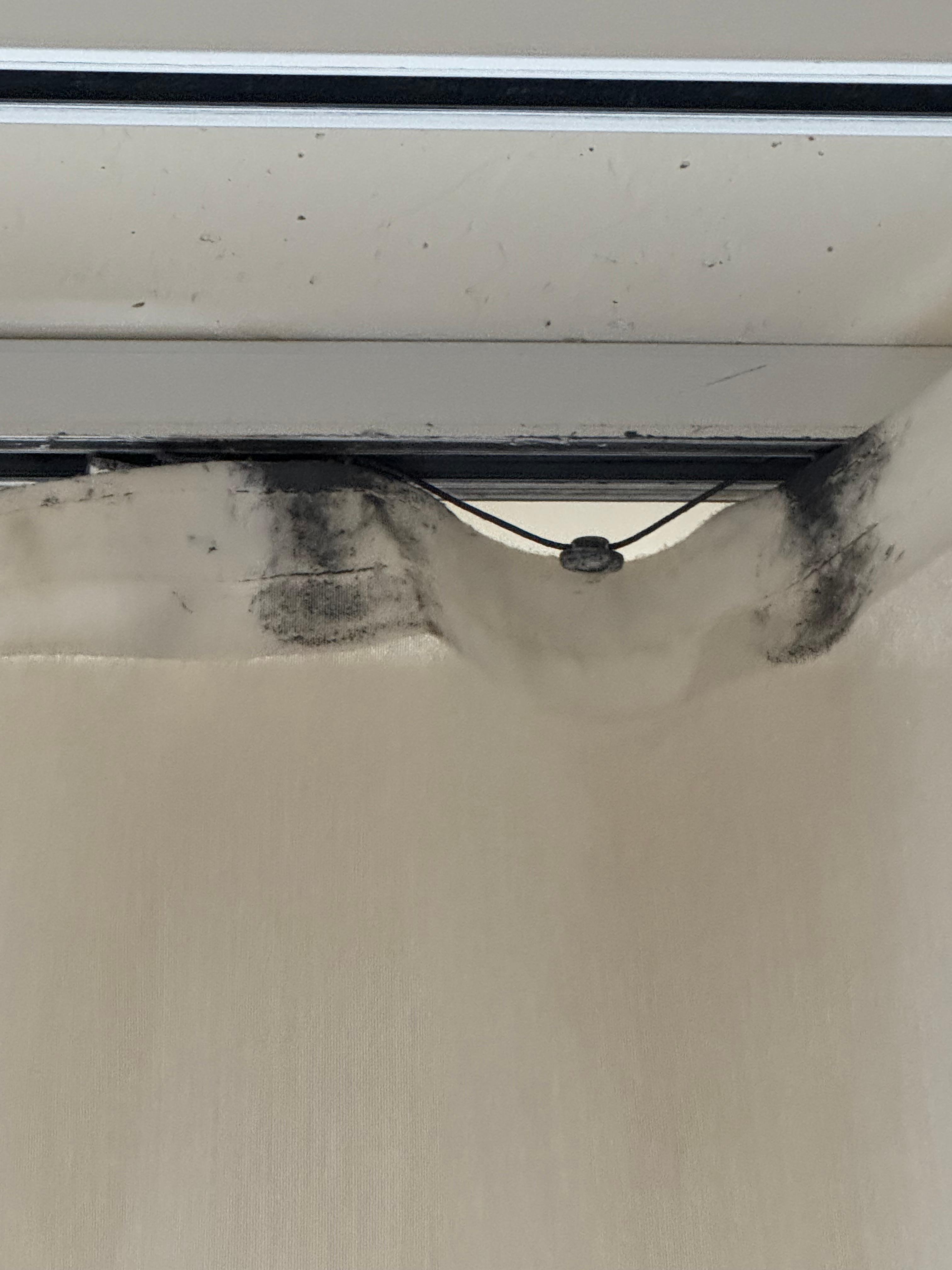 Ripped and dirty curtains 