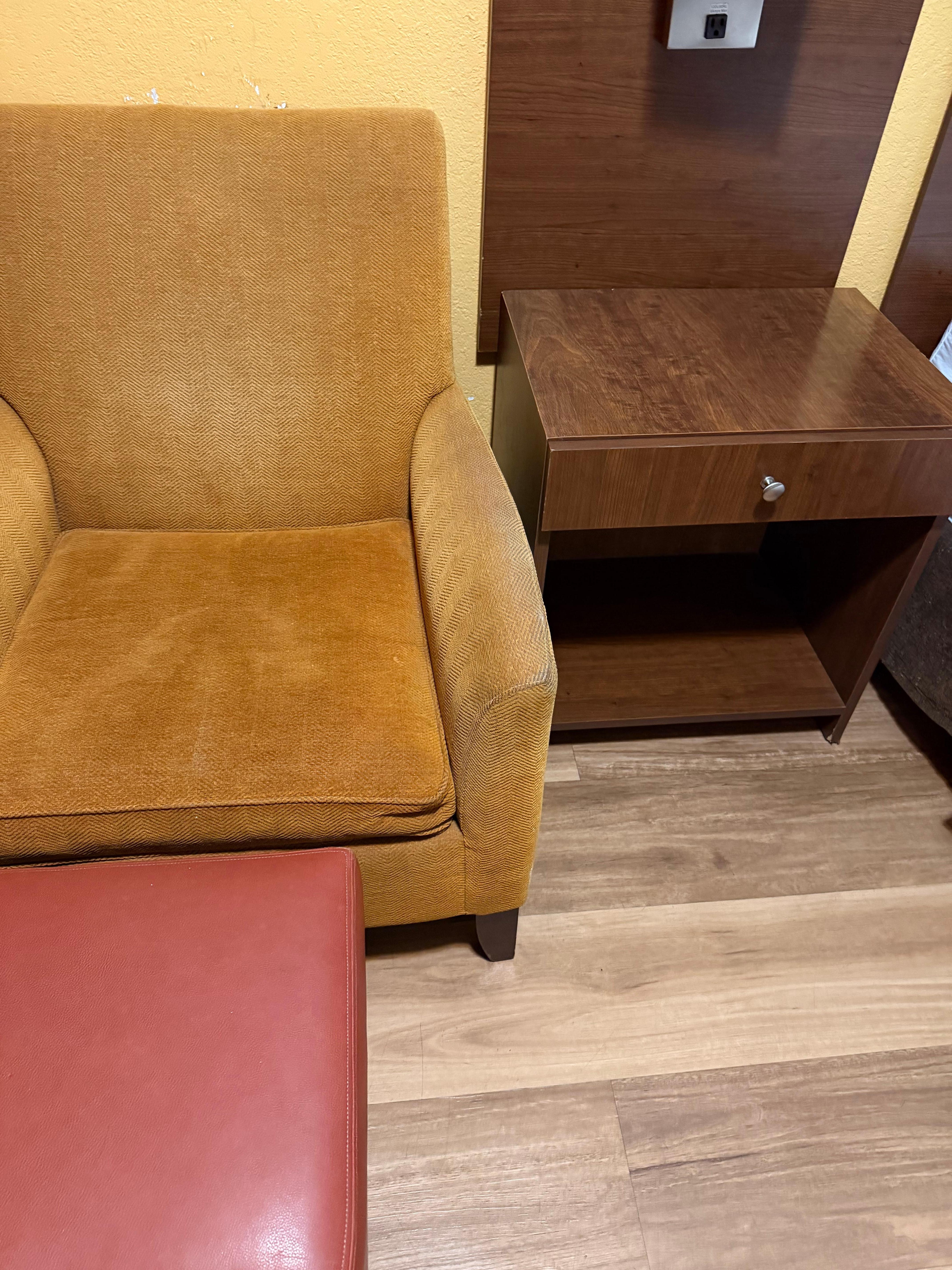 The couch in the corner