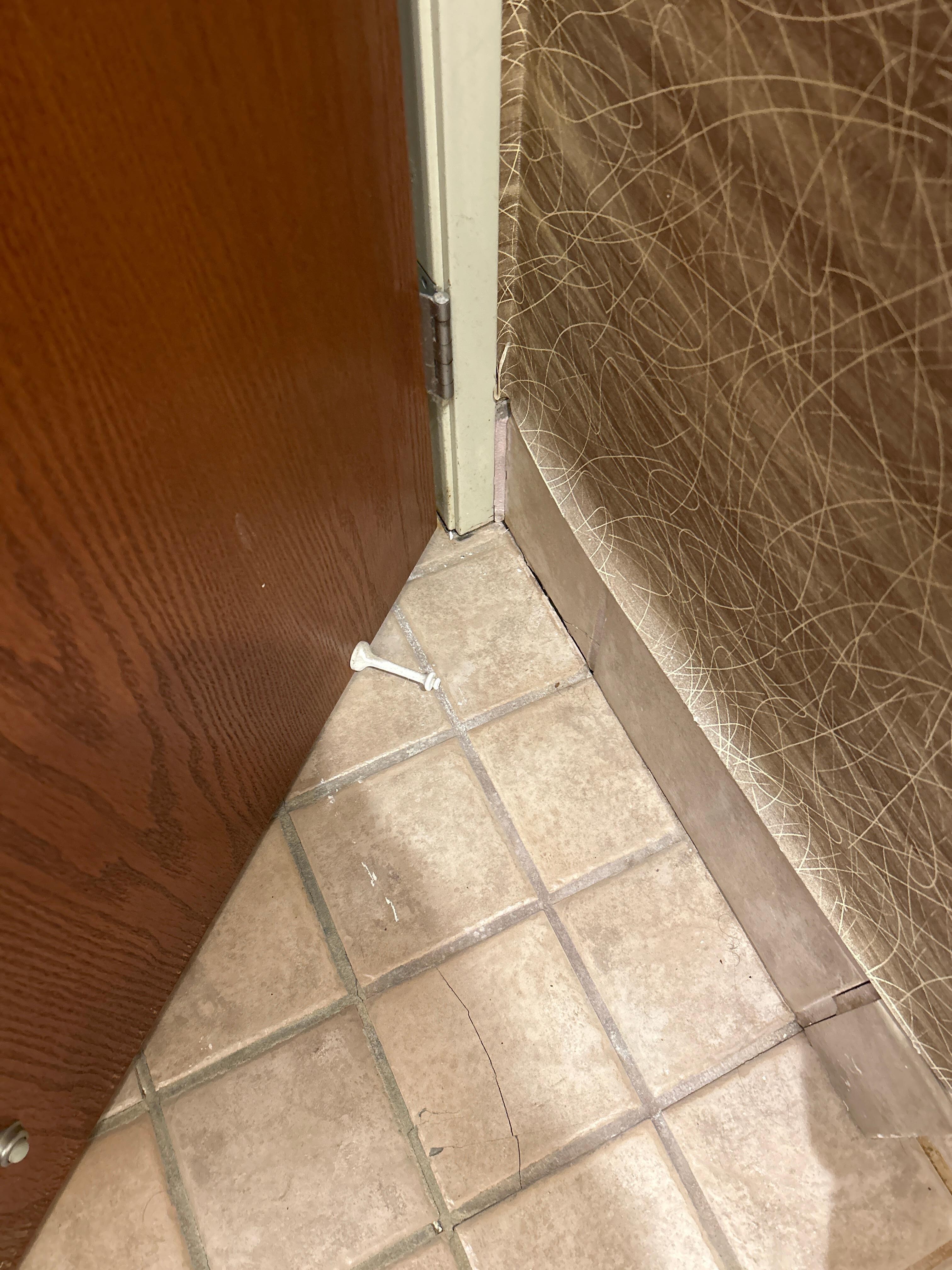 Wall paper coming off wall