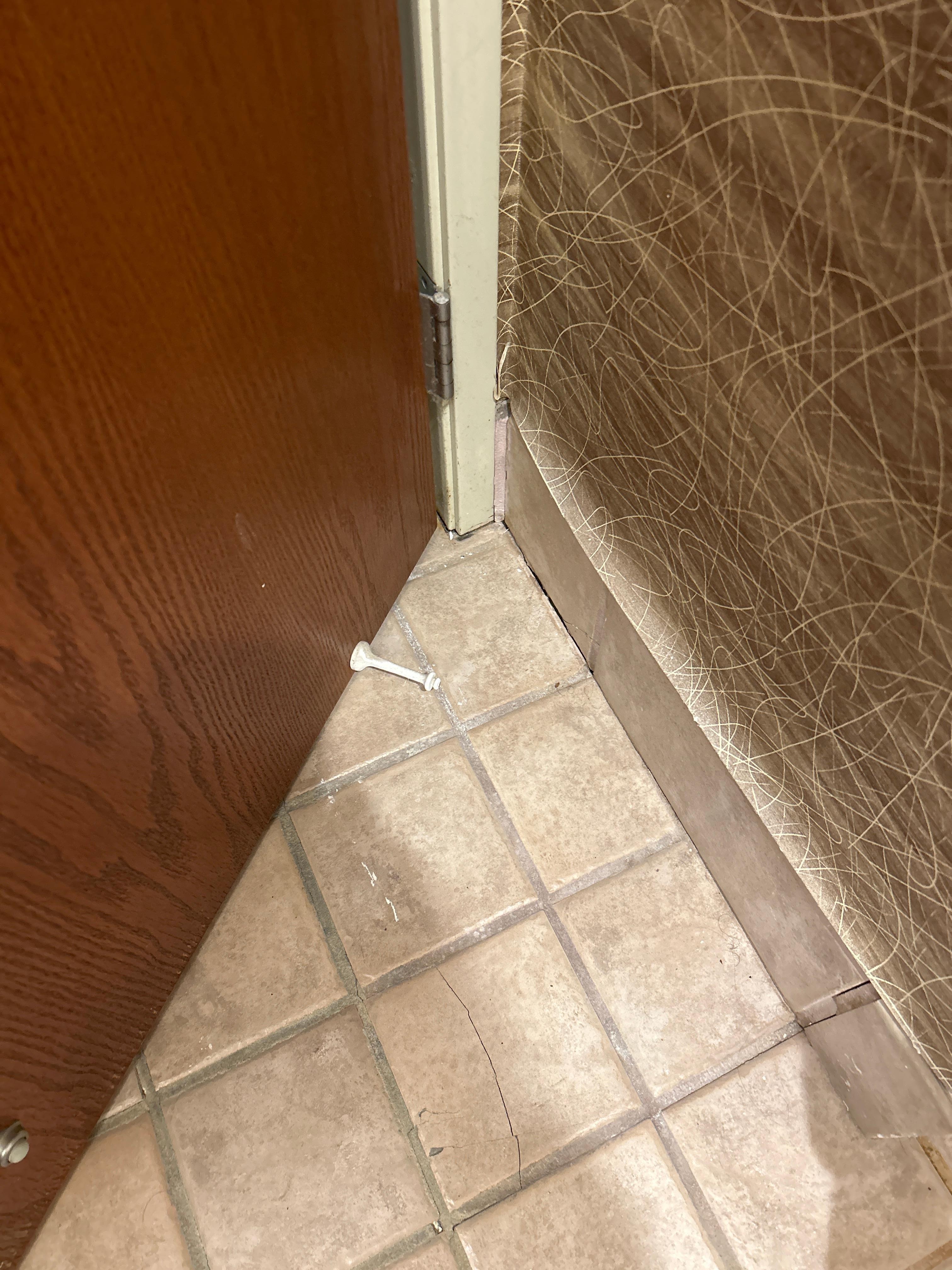 Wall paper coming off wall