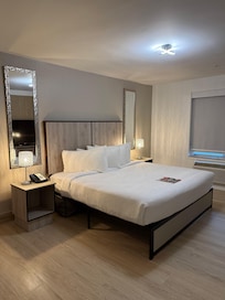 This is the bedroom with the king size bed. The lamps beside the bed or touch lamps, they dim or brighten just by touching them.